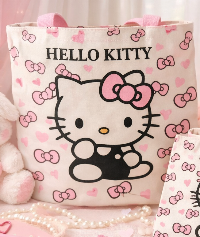 Hello Kitty bow tote bag with pink bows and hearts print