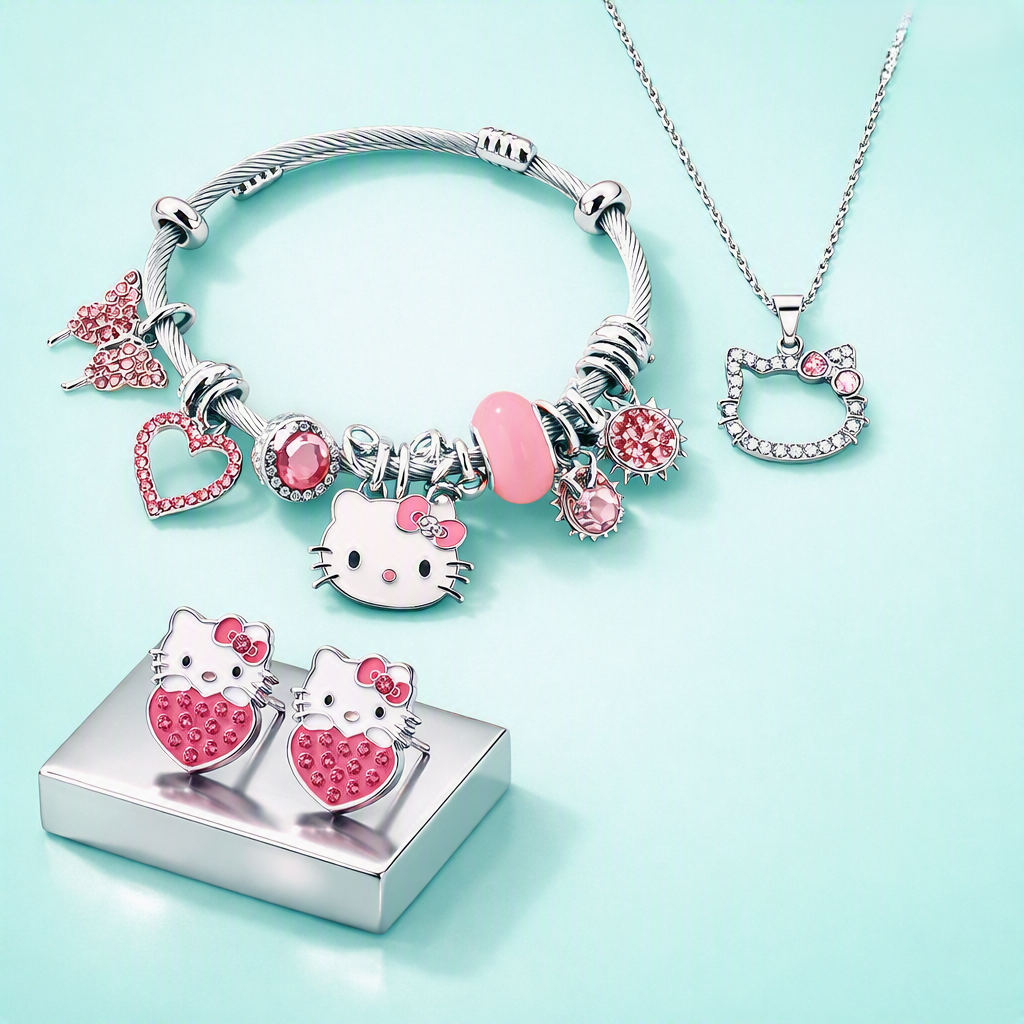 Hello Kitty pink jewelry set with charm bracelet, necklace and strawberry stud earrings