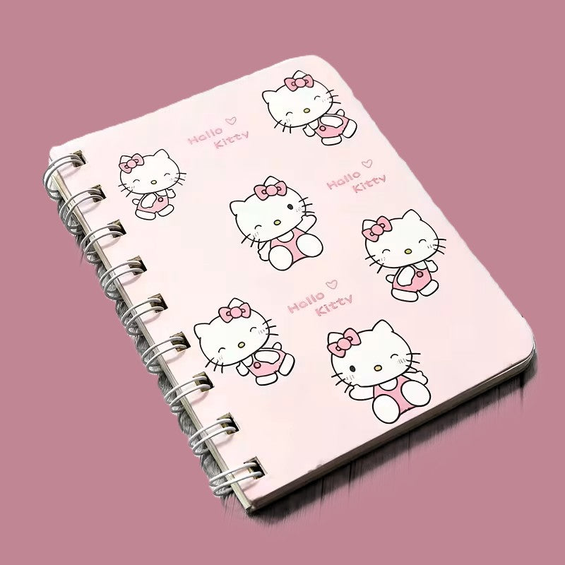 Hello Kitty mini notebook pink cover with Hello Kitty character and bows