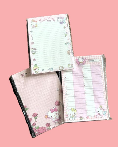 Hello Kitty notepads set with lined and grid pages in pastel pink with rose designs