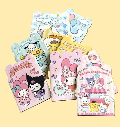 Sanrio character mini notebooks featuring Pochacco, Kuromi, My Melody, Cinnamoroll and Pom Pom Purin
