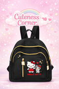 Hello Kitty black backpack with gold zippers and Hello Kitty graphic