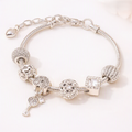 Silver Crystal Charm Bracelet – Elegant Key Edition